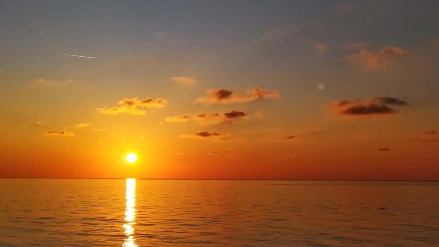 Lefkada: Sunset Cruise with Swimming &Local Wine in Meganisi - Setting Sail on a Scenic Ionian Sea Journey