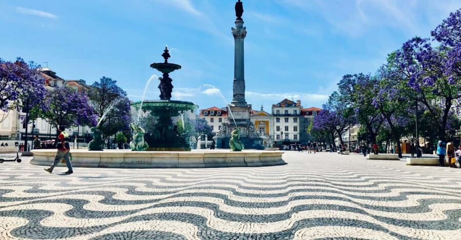 Lisbon: Old Town and Chiado Vintage Car Tour - Discovering Lisbon’s Historic Hills and Neighborhoods
