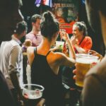 Lisbon: Pub Crawl with Open Bar (Premium Upgrade Available) - Starting at Praça Luís de Camoes in Lisbon