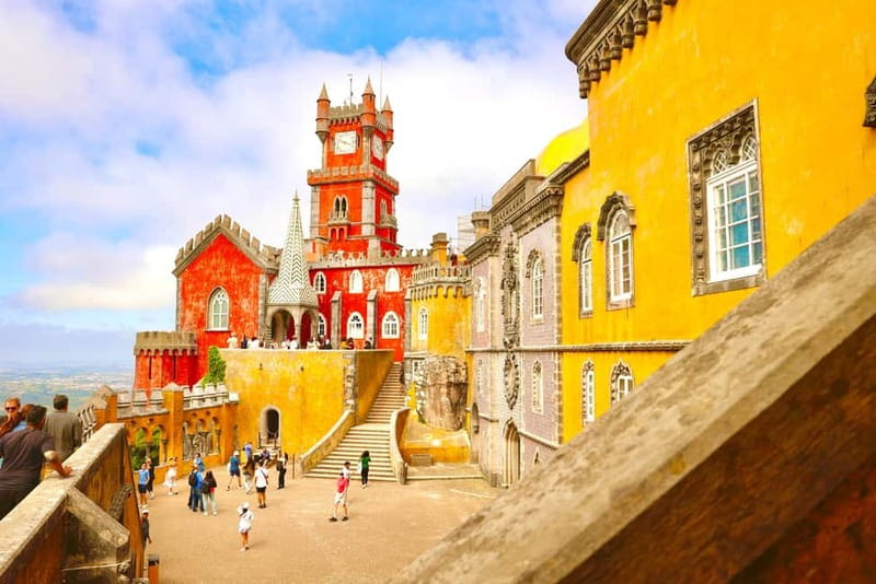 Lisbon: Sintra, Pena, Cascais & Cabo Day Tour with Tickets - Visiting Pena Palace: A Fairytale Castle in Sintra