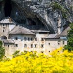 Ljubljana: Postojna cave & Predjama castle small group tour - Entering the World of Postojna Cave