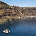Luxury Santorini Sunset Cruise: Dinner, BBQ, Open Bar, Transfers - Exploring Santorinis Iconic Coastal Landmarks