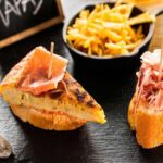 Madrid: Old Madrid Walking Food and Wine Tour - Visiting Madrids Main Landmarks During the Walk