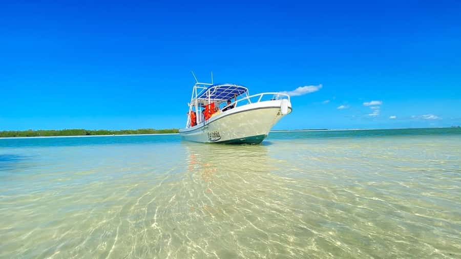 Magical Sunset at Sea off Holbox Island VIP + Lobster & Guacamole - Setting Off from Holbox Dock on a Private Speedboat