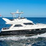 Miami Yacht Rental 58 ft + 1 Free Hr & 2 Jet Ski Rides | Boat Tour - Set out on a Scenic Route Past Miami’s Most Famous Sights