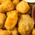 Minneapolis: North Loop Food Tour with 6 Local Tastings - Tasting the Coal-Fired Pizza and Cheese Curds