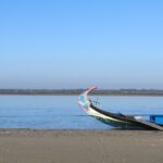 Moliceiro boat trip, with experience in bivalves harvesting - Experience the Bivalve Harvesting on an Island Stop