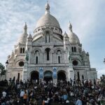 Montmartre District and Sacre Coeur - Exclusive Guided Walking Tour - Exploring the Iconic Moulin Rouge and Artist Residences
