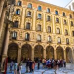 Montserrat & Winery Visit Tour with Traditional Farmhouse Lunch - Visiting Montserrat Monastery and Its Iconic Black Virgin