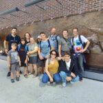NYC Essential Guided Walking Tour of Manhattan - The Symbol of Hope at Charging Bull on Wall Street