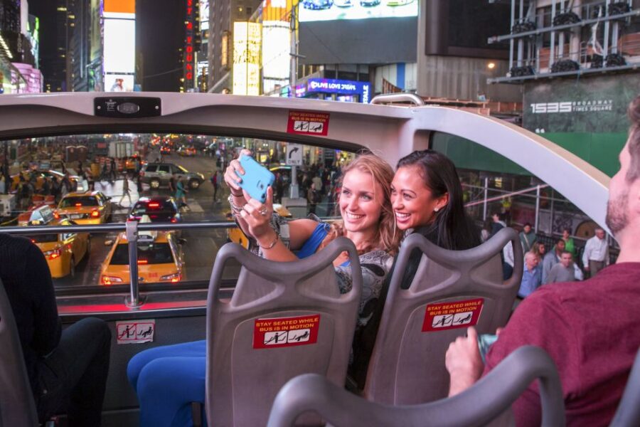 NYC: Sightseeing Night Tour by Open-Top Bus with Live Guide - Start at a Prime Midtown Location: M&Ms World at 7th Ave and West 48th St