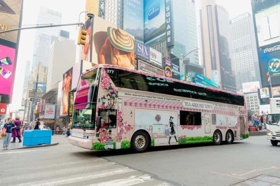 NYC: Tea Around Town Bus Tour with Live Entertainment - The Bright Pink Bus: A Visual Highlight of the Tour