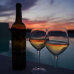 Oia: Retreat Infinity Pool Ticket with Sea and Sunset Views - Sipping Sparkling Wine at "Hippie Van" Bar in Oia