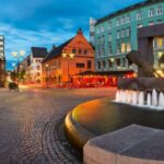 Oslo: Historic Myths & Legends Evening Walking Tour - The Intriguing Walls of Oslo City Hall with Vikings Art