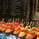 Palma's nightly charm and delicious local snacks - Discovering Palma’s Iconic Landmarks from Outside