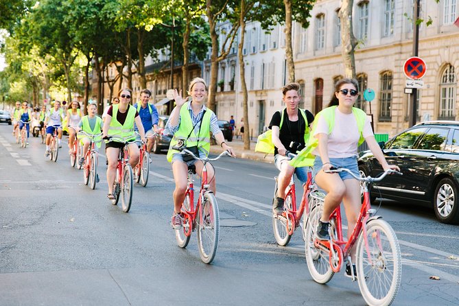 Paris by Night City of Lights Sightseeing Guided Bike Tour - Detailed Stops and Sights