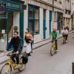 Paris Local Districts and Stories Off the Beaten Track Guided Bike Tour - Starting at Le Peloton Café: A Cozy Introduction to Paris
