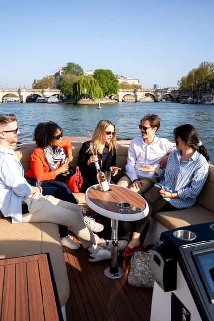 Paris: Private Small Boat Cruise with Rosé and Macarons - The Starting Point Near the Eiffel Tower and Ile aux Cygnes