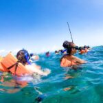 Party at Sea Private Catamaran Tour with Music and Drinks - Exploring Isla Mujeres: Snorkeling and Free Time