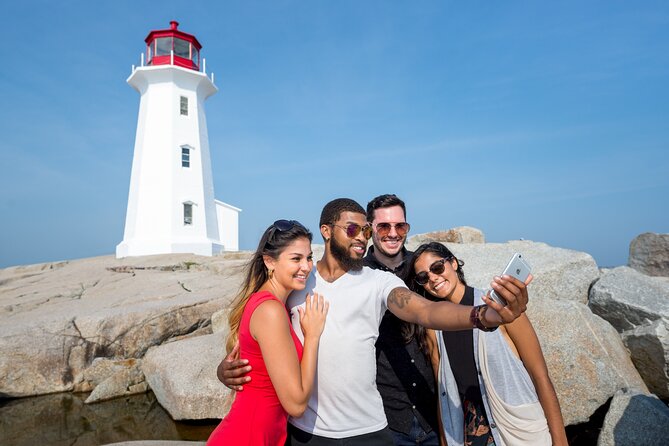 Peggys Cove Express Tour: Scenic Guided Experience - Exploring Peggys Cove Lighthouse and Rocky Shoreline