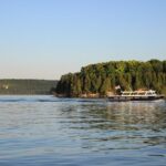 Peninsula Park Caves Scenic Boat Tour - Highlighting Eagle Bluff Lighthouse from the Water
