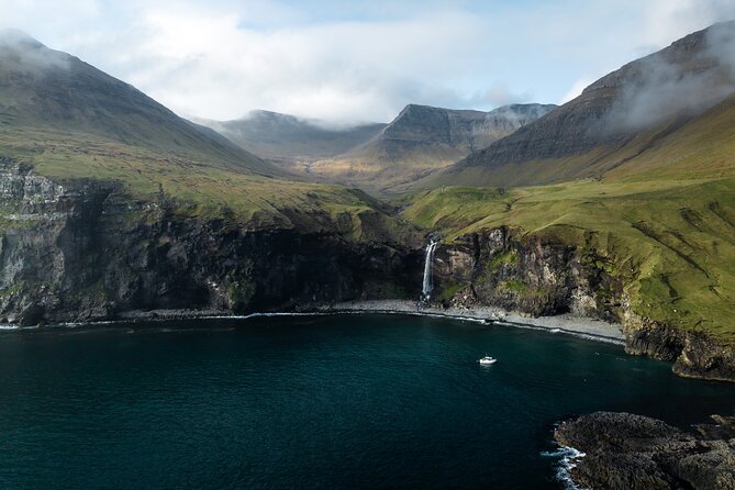 Photography Boat Tour in Vágar - Marvel at the Drangarnir Sea Stacks