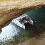 Portimao: SUNSET Benagil Caves Tour | Eco Catamaran - The Eco-Friendly Catamaran: A Sustainable Approach to Algarve Cruises