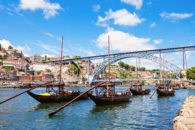 Porto Private Tour from Lisbon with Douro Cruise and Wine Tasting - Cruising the Douro River in a Rabelo Boat