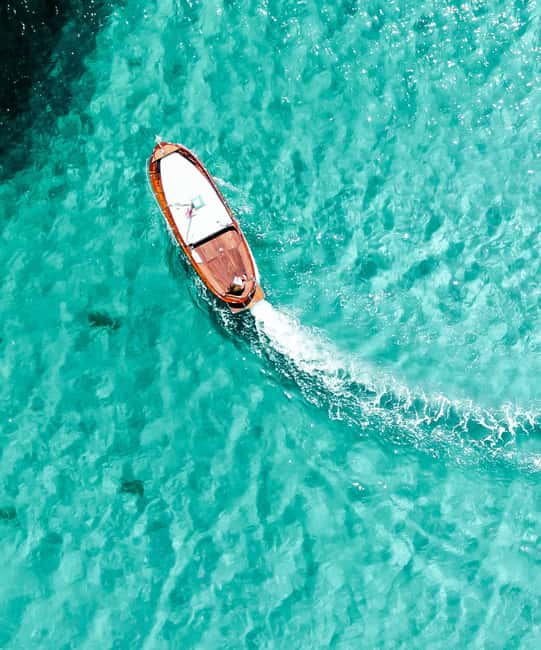 Porto San Paolo: Half Day Boat Tour to Tavolara and Molara - The Classic Boat: Comfort and Accessibility