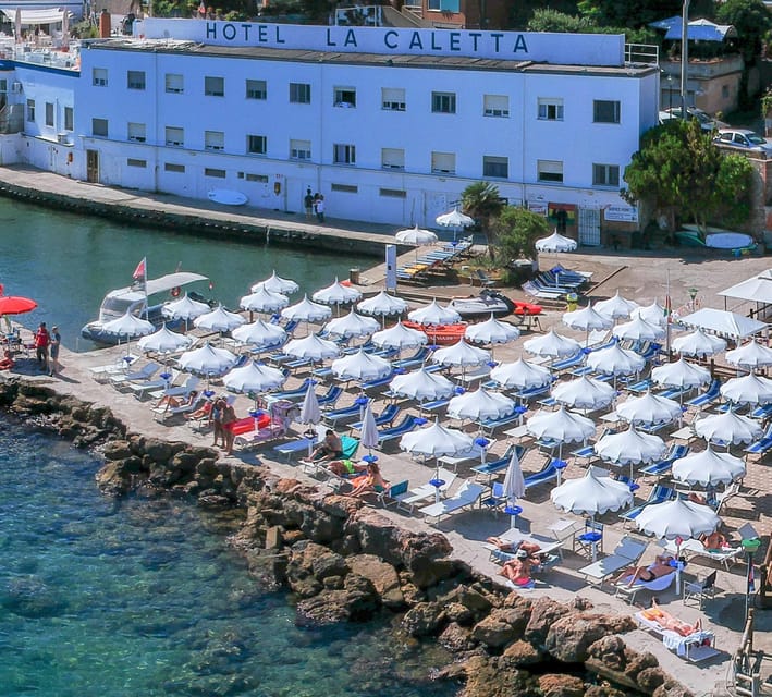 Porto Santo Stefano: La Caletta beach club - Cocktails under the umbrella - Discover the Argentario Coast from the Water