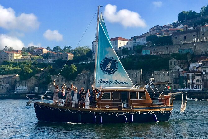 Porto: Tour on the Douro River in a Classic Boat - The Unique Charm of the Classic Wooden Sailboat