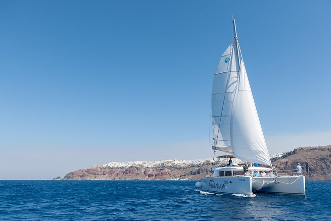 Premium Santorini Private Day Tour Elba 45, BBQ, drinks, transfer - Cruising Santorini’s Scenic Coast in a Private Catamaran