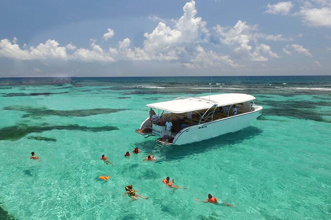 Private Boat to Isla Mujeres with Open Bar from Playa del Carmen - Sailing in Style on a Private Catamaran