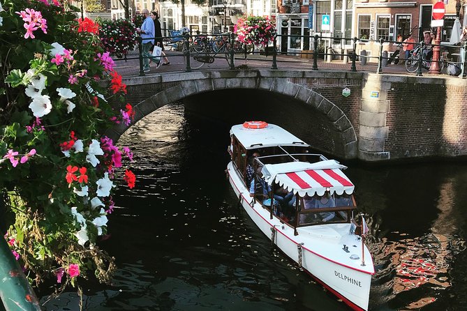 Private canal cruise on small historic boat - Embark from the HART Museum in Amsterdam