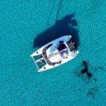 Private Catamaran Cruise Mykonos Delos with Meals & SUP - The Starting Point and Group Size