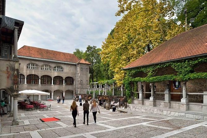 Private city tour of Ljubljana. 4 hours with a friendly and fun local guide. - Visiting the Iconic Triple Bridge by Joe Plenik