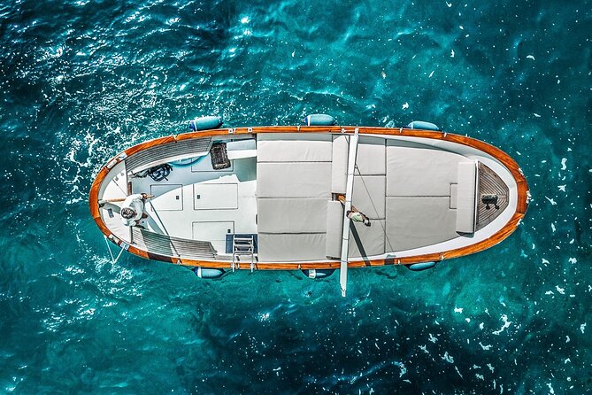 Private Gozzo Boat Tour of Capri Island - Capturing the Perfect Photo at I Faraglioni