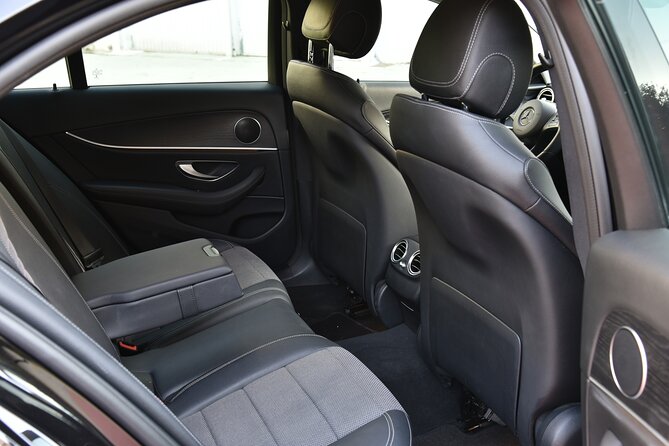 Private Limo Transfer From ATH Airport To Athens/Pireaus/Suburbs - Meeting Point at Athens International Airport