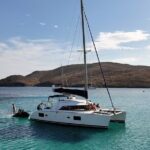 Private Mykonos Catamaran Day Cruise with Meals & Water Toys - Savoring the Views of Mykonos Iconic White Houses
