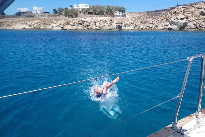 Private sailing cruise to Delos & Rhenia with Lunch & Transfer - Sunbathing and Swimming at Rhenias Solitary Beaches