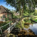 Private Sightseeing Tour to Giethoorn Dutch Venice from Amsterdam - Discovering Giethoorn’s Canal Network and Charming Houses
