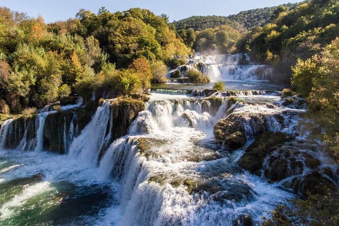 Private tour Krka Waterfalls: Boat ride; Wine & Food tasting - Scenic Boat Ride Through Krka Waterfalls