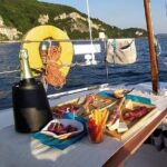 Private Tour on a Sailing Boat on Lake Maggiore with Aperitif and Music - The Route: Sailing to Santa Caterina del Sasso at Sunset