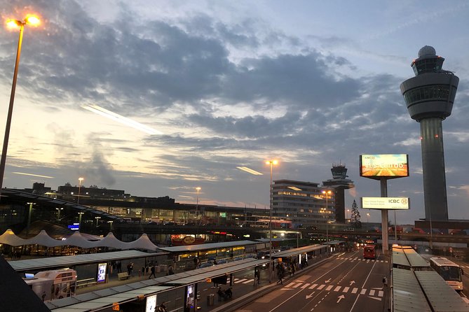 Private transfer Amsterdam (AMS) to/from Brussels - Meeting Point and Pickup Service at Schiphol Airport