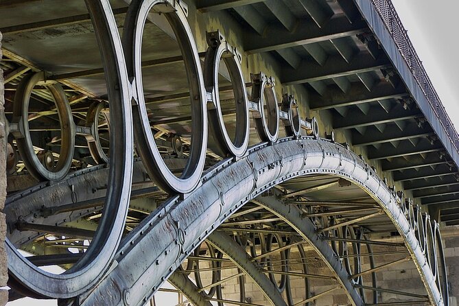 Private walking tour of Triana in Seville - Crossing the Iconic Puente de Isabel II (Triana Bridge)