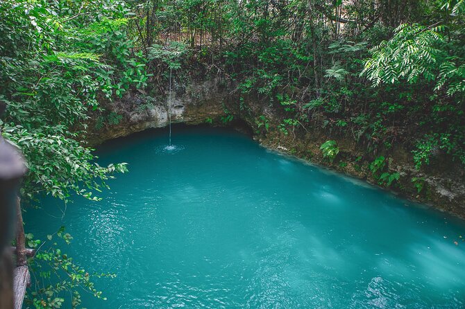Relaxation activity in two cenotes with food included. - Relaxing at Two Turquoise Cenotes Surrounded by Nature