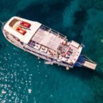 Rhodes Bay to Bay Swim Cruise-Greek Buffet w/wine included - The Scenic Voyage Past Rhodes Medieval Walls and the Colossus Site
