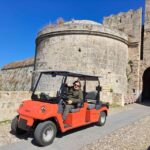 Rhodes: Old Town Highlights Guided Tour by Eco Vehicle - Discovering Rhodes Medieval Walls and Moats