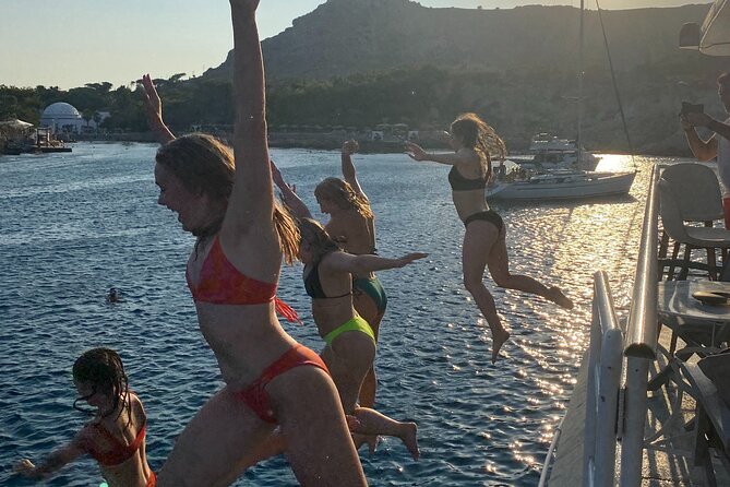 Rhodes Sunset Cruise - Swim and Dine w/ Live Music & Sunset! - Embarking at Mandraki Port for a Scenic Introduction to Rhodes