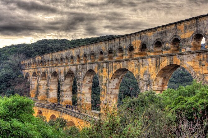 Roman heritages and Chateauneuf du Pape Wine Tour from Avignon - Walking Tour Through Medieval Uzès